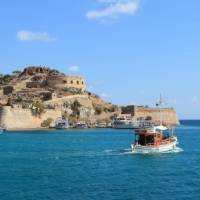 The stunning coastline of Crete Island features fine sandy beaches and tranquil blue water