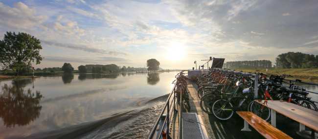 Sarah sailing at sunset